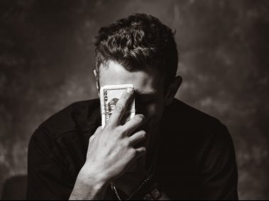 man holding banknote